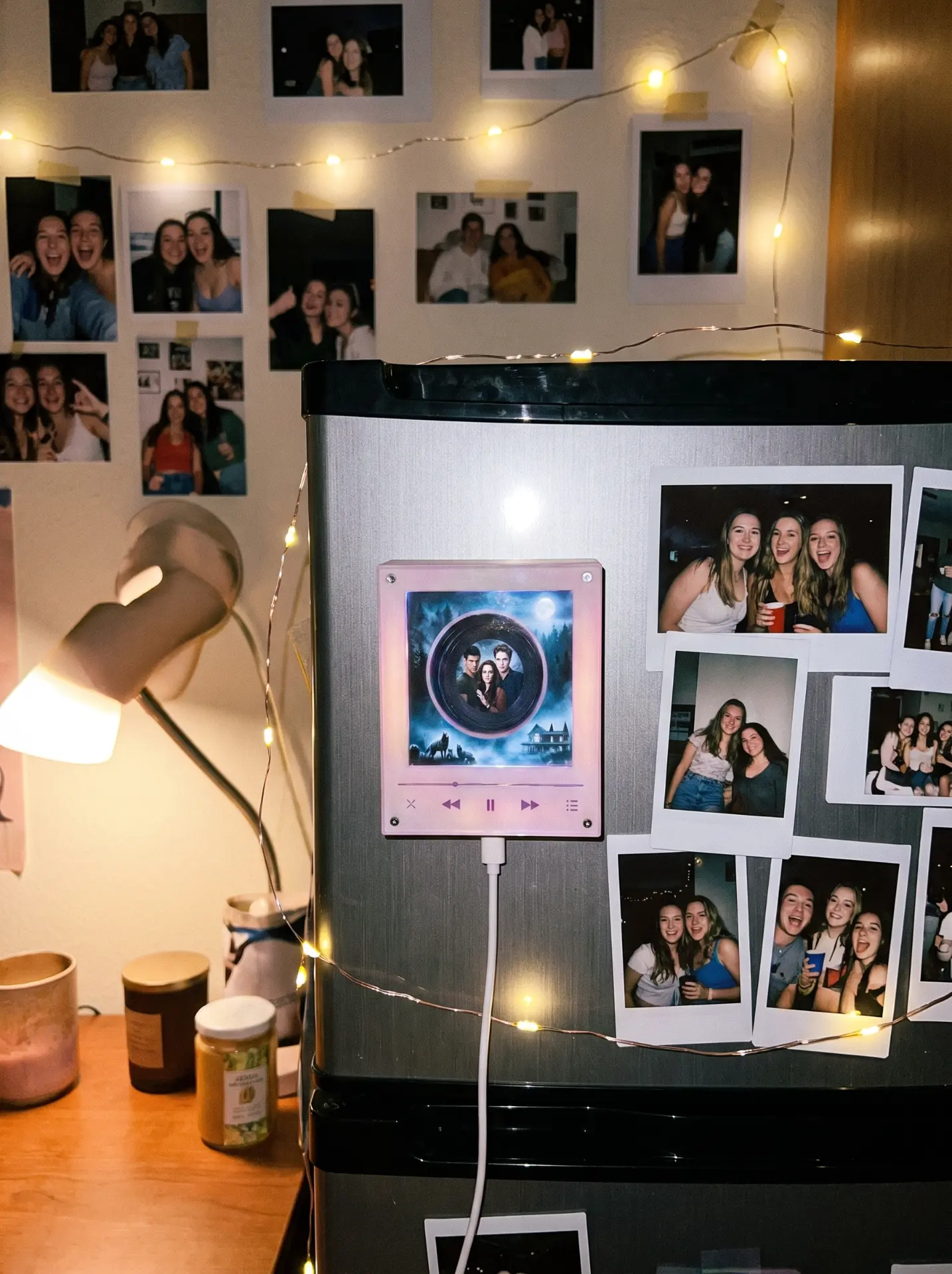 Echofy music box magnet in a dorm room lit by fairy lights